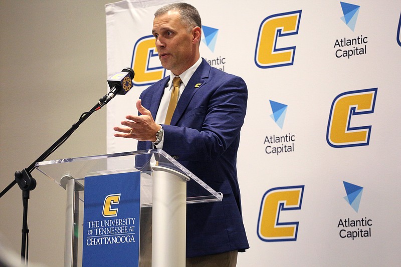 New UTC football Rusty Wright speaks during his introductory news conference on campus Friday.
