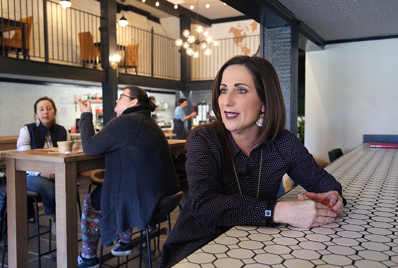 Deven Wallace, lead for the Together Coalition and founder of the Zion Project, talks about what the Together Coalition does during an interview at the Together Cafe Monday, December 18, 2018 in Chattanooga, Tennessee. The Together Coalition consists of a few core organizations dedicated to ending human trafficking of women and children.