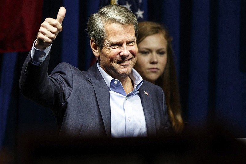 Republican gubernatorial candidate Brian Kemp gives a thumbs up as he greets the crowd during a "Get Out The Vote" rally at the Dalton Convention Center on Thursday, Nov. 1, 2018 in Dalton, Ga. Republican Brian Kemp is facing off against Democrat Stacey Abrams for governor in Georgia.