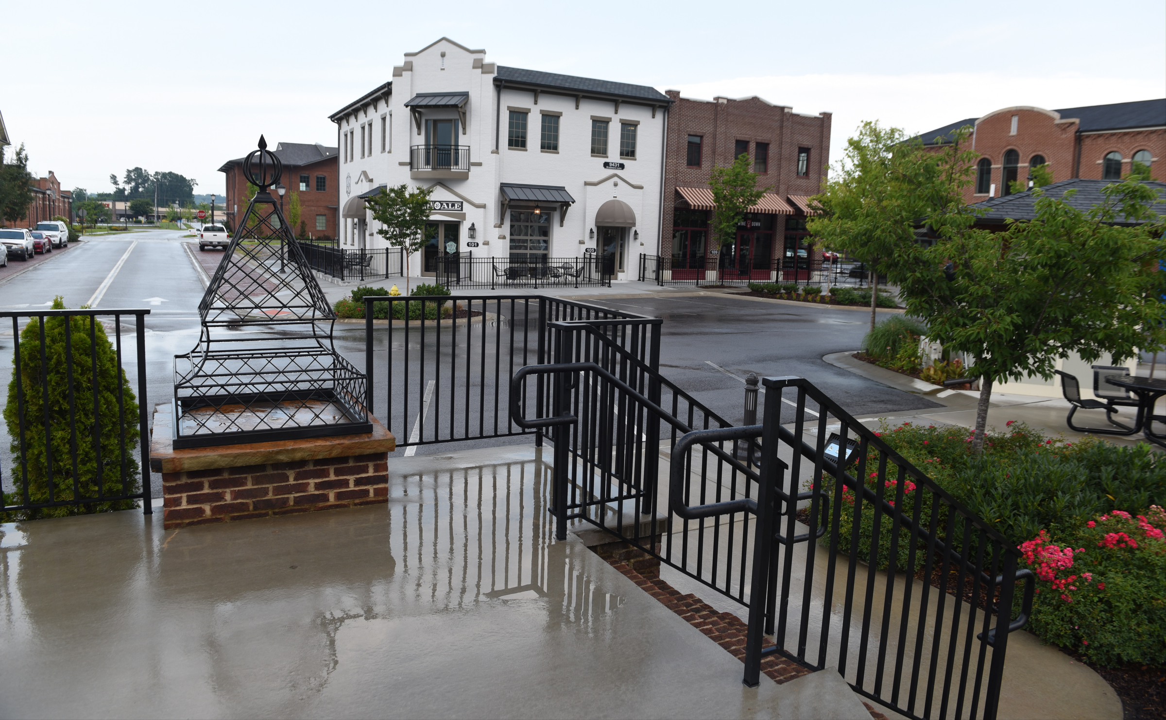 The recently-opened Heaven and Ale, the white building at left, is located next to Wine Down, a soon-to-open wine tasting room that will also serve food, beer and liquor, photographed on Tuesday, June 30, 2015, at Cambridge Square in the Ooltewah community in Chattanooga, Tenn.