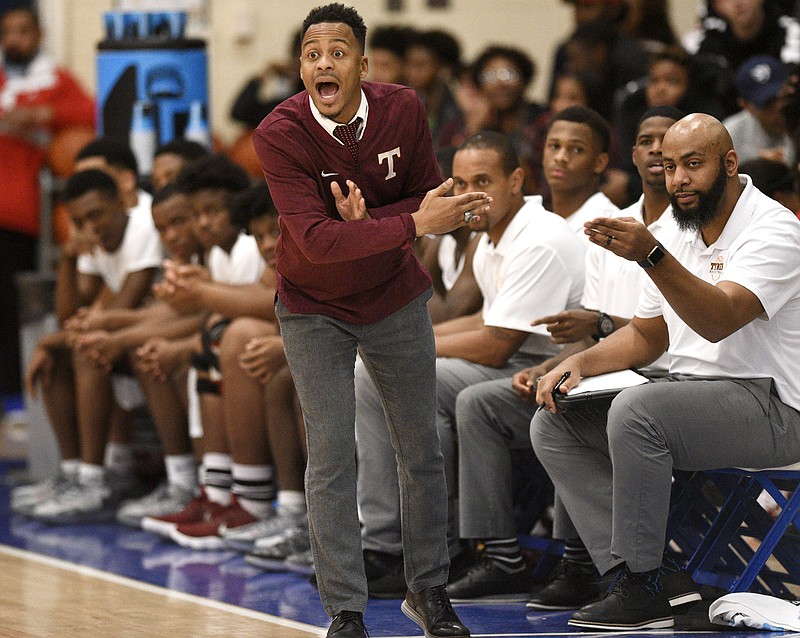 Tyner boys' basketball coach E'jay Ward shouts instructions to his players during their game against Notre Dame in the first round of the Best of Preps basketball tournament Thursday at Chattanooga State.