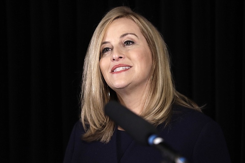 This March 6, 208, file photo shows Nashville Mayor Megan Barry announcing her resignation in Nashville, Tenn. This top story in Tennessee this year was Barry's affair with her bodyguard, a stunning admission that captured national attention and resulted in her pleading guilty to a related felony theft count and resigning, according to an annual Associated Press survey of reporters, editors and broadcasters. Barry, who was a rising star in the Democratic ranks, stood on stage alone during a January news conference and confessed to the extramarital relationship with the former head of her security detail, ex-police Sgt. Robert Forrest. (AP Photo/Mark Humphrey, File)