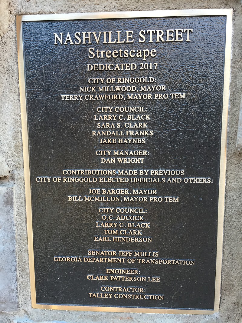 Ringgold officials past and present are honored for their work on the city's streetscape project through this plaque unveiled Dec. 17. (Contributed photo)