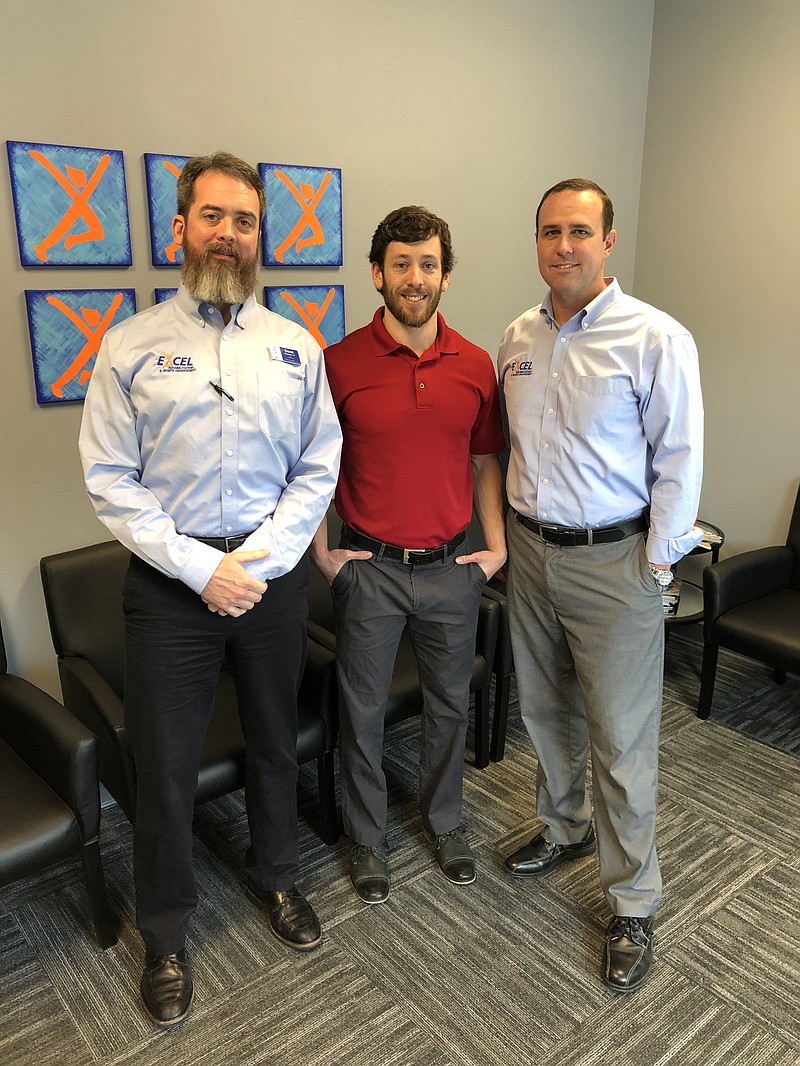 Excel Rehab & Sports physical therapists David Brackett, Jeff Potts and Jeremy Shook, from left, stand in the Hixson clinic.