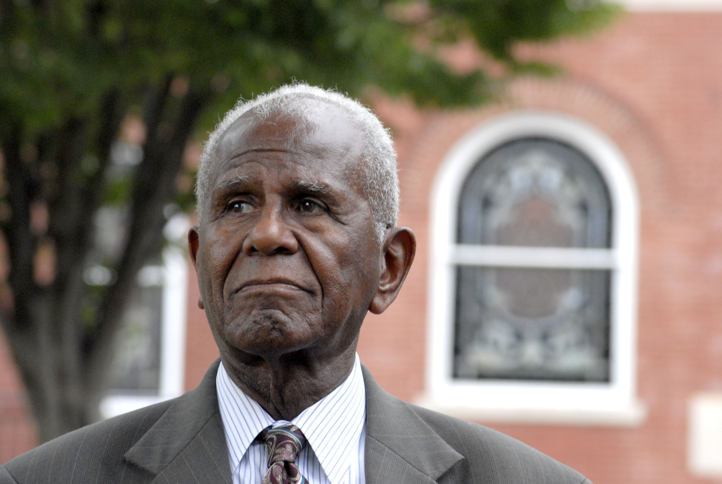 Staff Photo by Allison Kwesell /
John Franklin Sr., former vice mayor and the first elected black official in Chattanooga, talks to guests during held by the Chattanooga History Museum about M.L. King Boulevard on Tuesday.