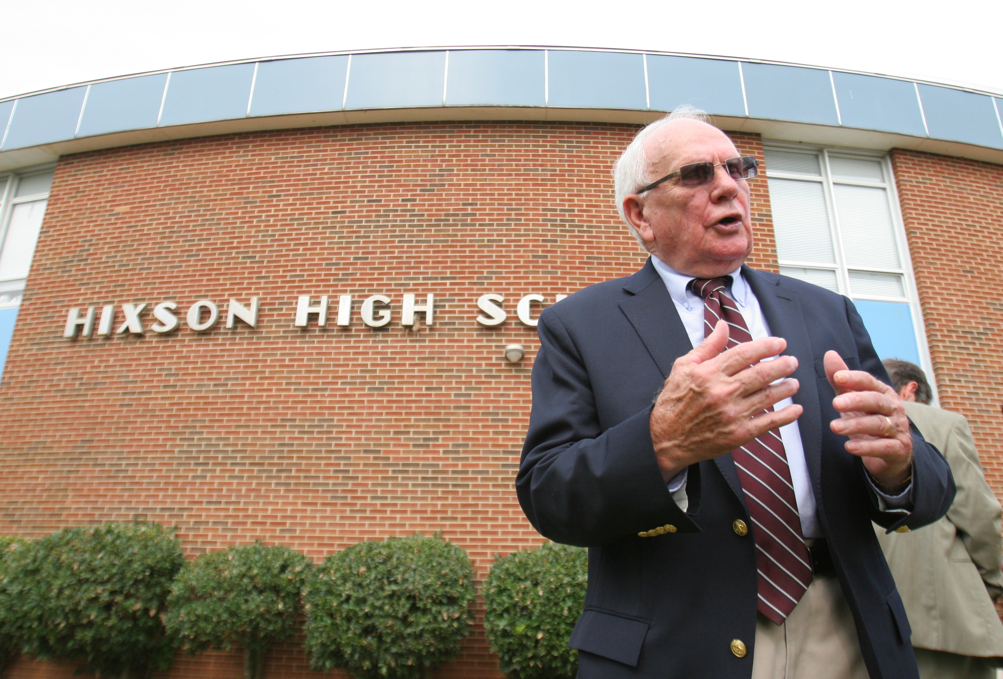 Staff Photo by Dan Henry /
Everett Fairchild, a school board member, speaks about Hixson High School 100-year anniversary celebration.