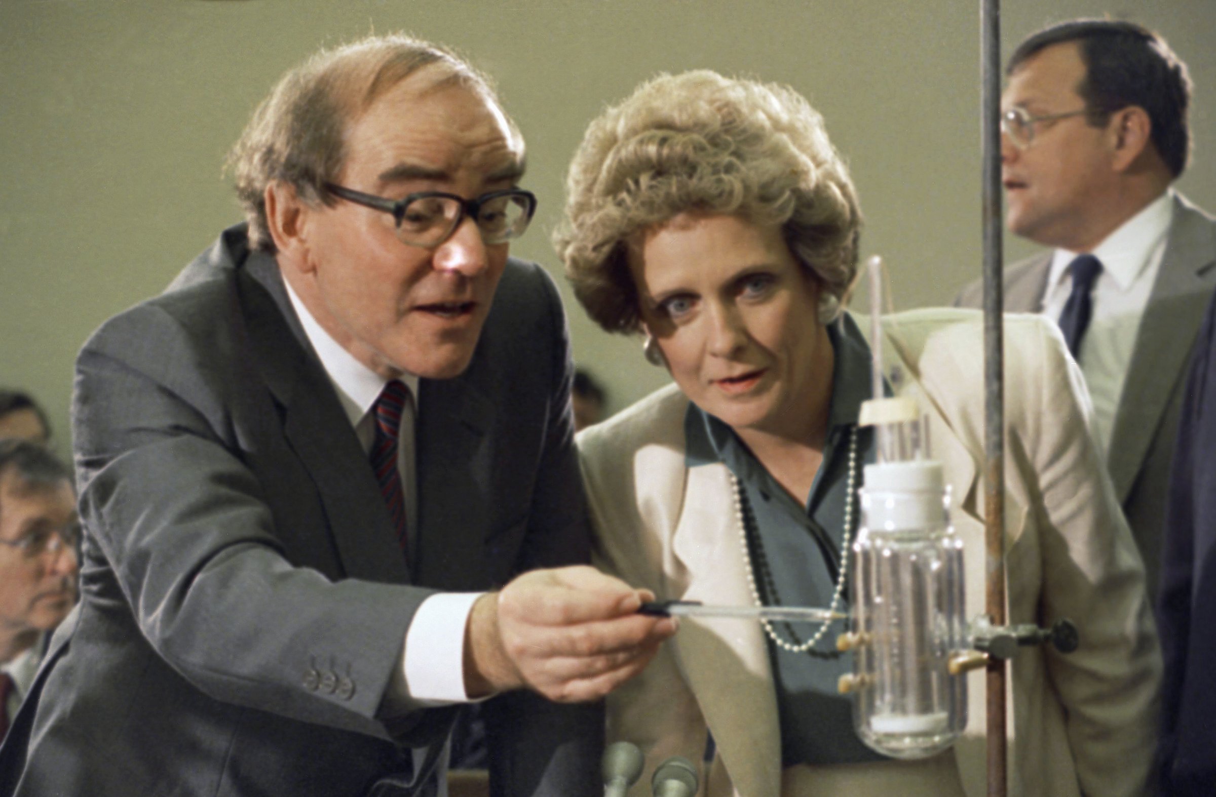Researcher Martin Fleischmann, left, of the University of Southampton in England explains his fusion experiment to House Energy, Research and Development subcommittee chairwoman Marilyn Lloyd, D-Tenn., during a hearing on Capitol Hill, Wednesday, April 26, 1989, Washington, D.C. Fleishmann teamed up with Utah chemist Stanley Pons to develop a cold-fusion process to produce energy. (AP Photo/Margot Ingoldsby)