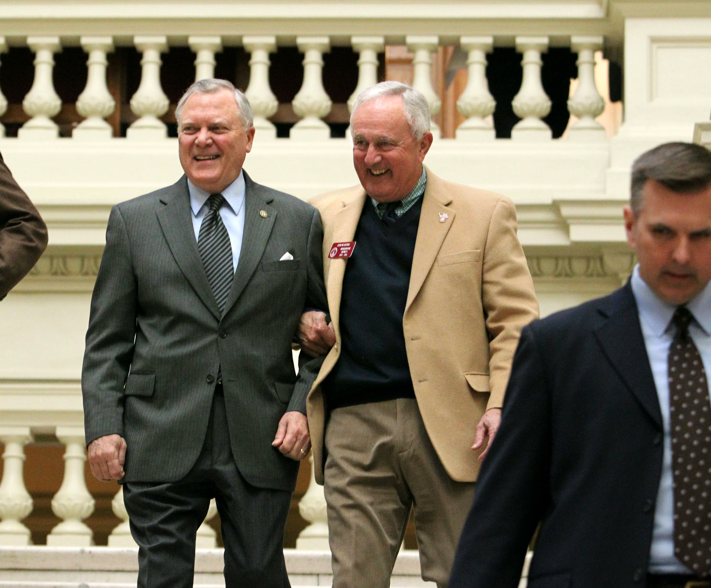 Gov. Nathan Deal, right, walks down the stairs with Rep. John Meadows, R-Calhoun, left, as he returns to his office after presenting his budget plan to the House Appropriations Committee, Tuesday, Jan. 22, 2013, in Atlanta. Gov. (AP Photo/Atlanta Journal-Constitution, Jason Getz)