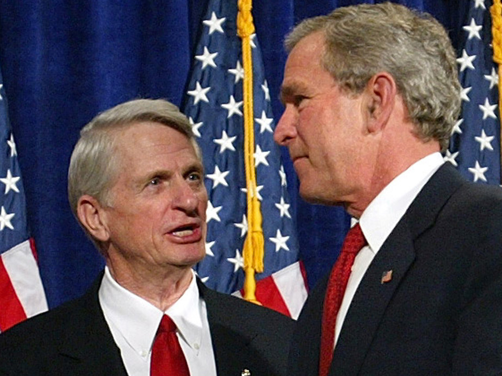 President George Bush is seen with Sen. Zell Miller, D-Ga., after making remarks at the Georgia World Congress Center during a political fundraiser, in this Jan. 15, 2004, file photo, in Atlanta. (AP Photo/Lawrence Jackson, File)