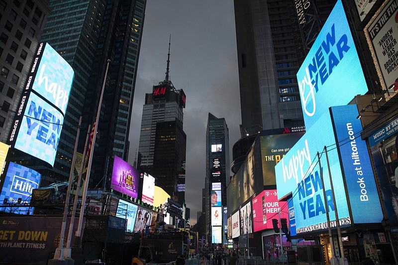 Billboards welcome in the new year in New York's Times Square, Monday, Dec. 31, 2018. (AP Photo/Mark Lennihan)

