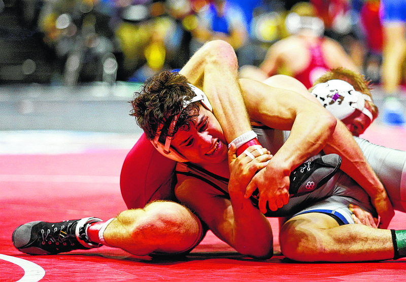 UTC's Chris Debien, left, wrestles Lock Haven's D.J. Fehlman during their Southern Scuffle wrestling tournament round of 16 bout at McKenzie Arena on Tuesday, Jan. 1, 2019, in Chattanooga, Tenn. 