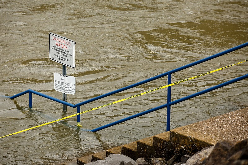 A Tennessee Riverpark pier is flooded as TVA spills water from the Chickamauga Dam on Wednesday, Jan. 2, 2019, in Chattanooga, Tenn. The Tennessee Valley Authority has declared 2018 the wettest year on record for the Tennessee Valley region with 67.1 inches of rainfall, surpassing a previous record of 65.1 inches set in 1973.