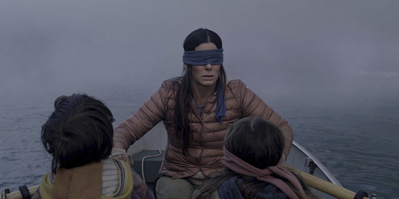 This file image released by Netflix shows Sandra Bullock in a scene from the film, "Bird Box." Netflix lifted the usually tightly sealed lid on its viewership numbers in a recent tweet that disclosed 45 million subscriber accounts had watched the thriller, "Bird Box," during its first seven days on the service. That made the film the biggest first-week success of any movie made so far for Netflix's 12-year-old streaming service. (Merrick Morton/Netflix via AP, File)