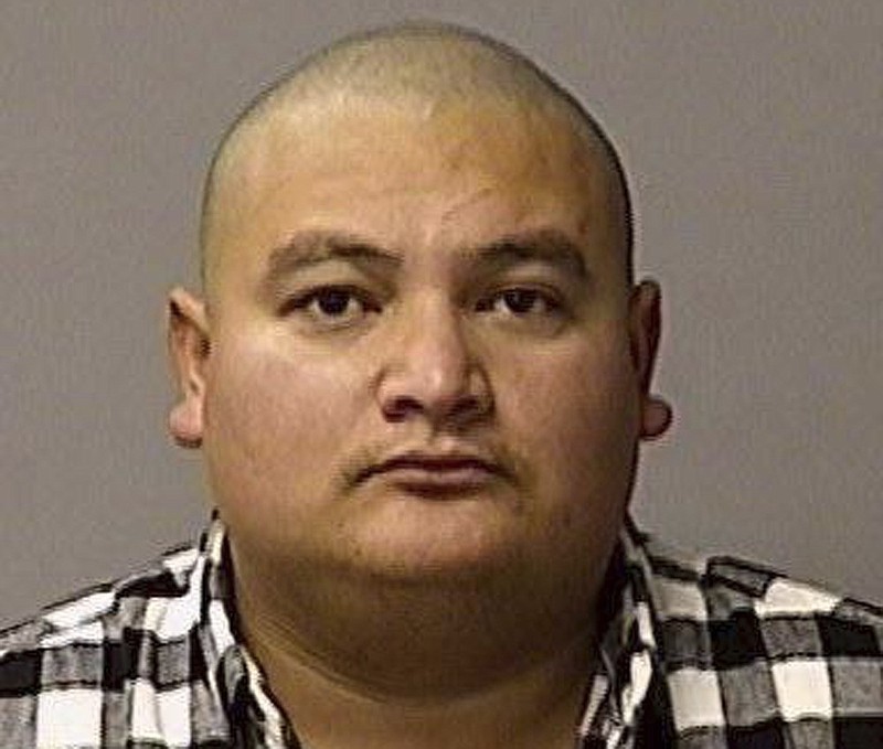 FILE - This undated booking file photo provided by the Stanislaus County Sheriff's Department shows Gustavo Perez Arriaga. Prosecutors charged Perez Arriaga on Wednesday, Jan. 2, 2019, with murder in the killing of Newman police Cpl. Ronil Singh. He was arrested Friday in the Dec. 26 shooting during a traffic stop. (Courtesy of Stanislaus County Sheriff's Department via AP, File)

