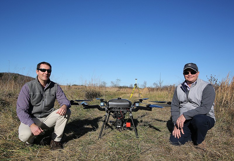 Andy Carroll, Skytec CTO, and Bill Rogers, Skytec CEO, pose for a photo with one of their drones Monday, December 17, 2018 at a farm in McDonald, Tennessee. Skytec can provide a variety of imaging services including aerial lidar, photogrammetry, thermal imaging and site inspection. 