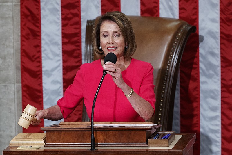 House Speaker Nancy Pelosi of California holds the gavel at the Capitol in Washington on Thursday. (AP Photo/Carolyn Kaster)