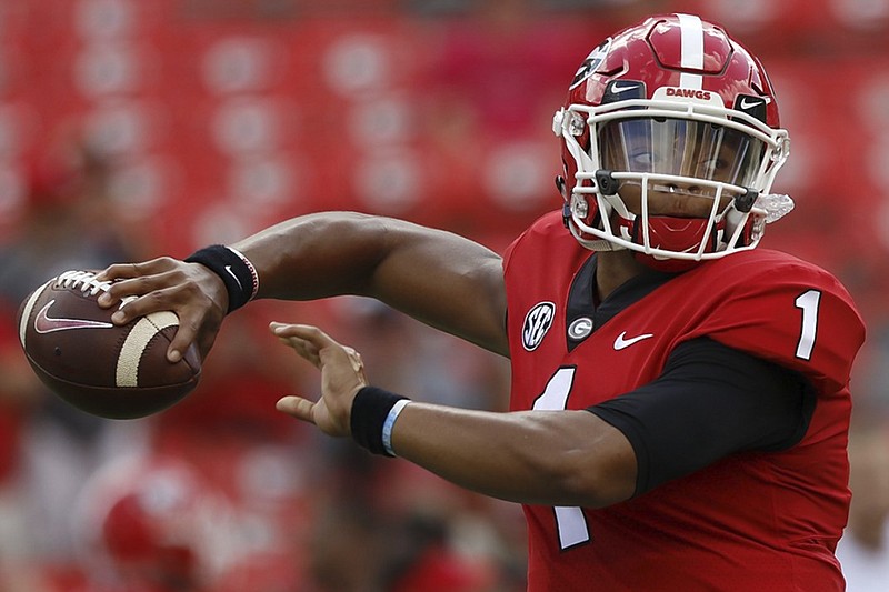 Justin Fields, shown warming up before Georgia's home game against Tennessee this past September, transferred to Ohio State last month and was granted a waiver by the NCAA that makes him immediately eligible to play for the Buckeyes.