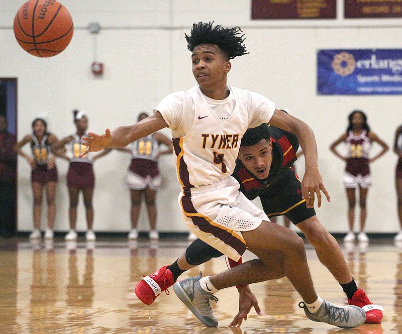 Tyner's Kameron Dozier (4) goes after a loose ball during the Rams' home game against Howard on Friday night.