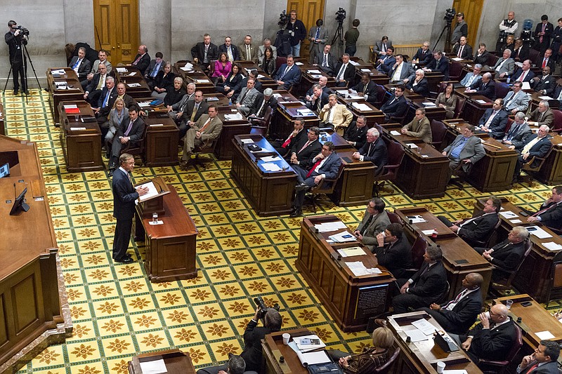 Republican Gov. Bill Haslam addresses state lawmakers at the state Capitol in Nashville, Tenn., on Monday, Feb. 2, 2015. Haslam spoke to a joint assembly of the General Assembly to promote his Insure Tennessee proposal to extend health coverage to 280,000 low-income residents. (AP Photo/Erik Schelzig)