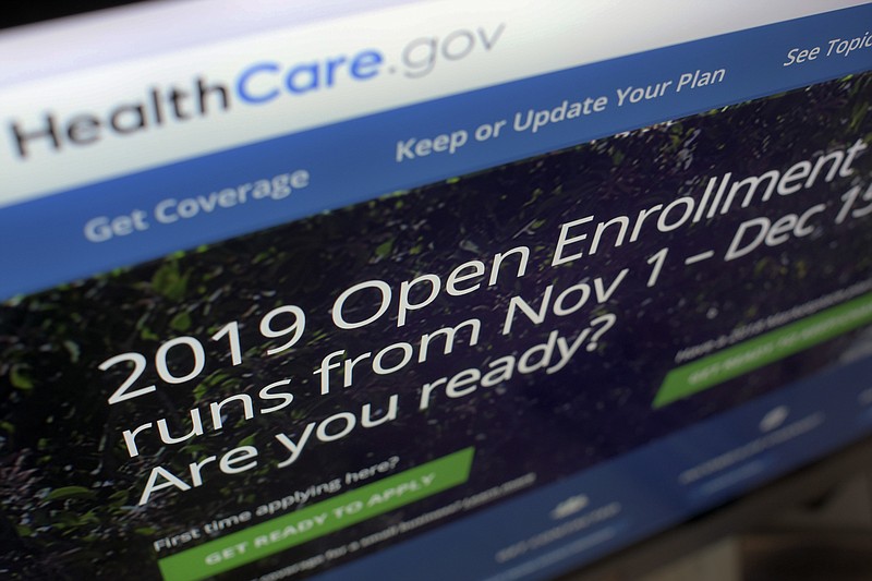 FILE - This Oct. 23, 2018 file photo shows HealthCare.gov website on a computer screen in New York.  Small business issues often win bipartisan support on Capitol Hill, but given the divisions in the incoming 116th Congress, advocates for companies have low expectations.  (AP Photo/Patrick Sison)