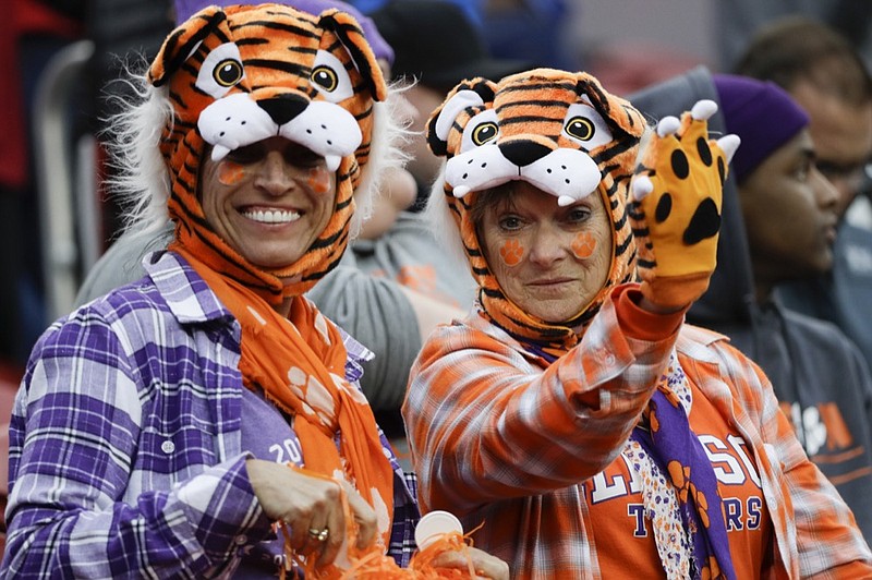Fans wait for the start of the NCAA college football playoff championship game between Alabama and Clemson Monday, Jan. 7, 2019, in Santa Clara, Calif. (AP Photo/David J. Phillip)

