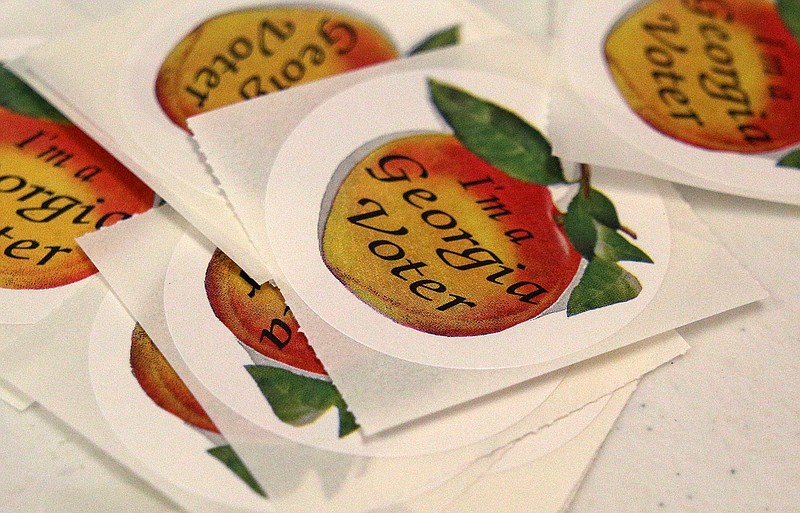 Stickers sit on a table for voters as they leave the room after voting in the special election for the State House District 5 race at the Calhoun City Recreation Department Tuesday, January 8, 2019 in Calhoun, Georgia. The special election was held to fill the position, which was previously held by Rep. John Meadows, who died in November from cancer.