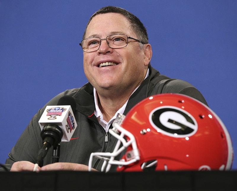 Jim Chaney, shown taking questions last month during a news conference before the Sugar Bowl in New Orleans, worked as Georgia's offensive coordinator the past three seasons. Now he's coming back to the same position at Tennessee, where he worked from 2009 to 2012.