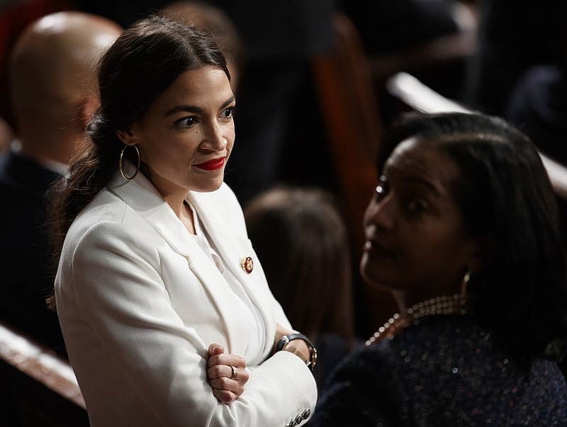 Rep. Alexandria Ocasio-Cortez, D-New York, and Rep. Jahana Hayes, D-Connecticut, stand together on the House floor at the U.S. Capitol in Washington on Jan. 3, 2019, on the first day of the 116th Congress with Democrats holding the majority. (AP Photo/Carolyn Kaster)