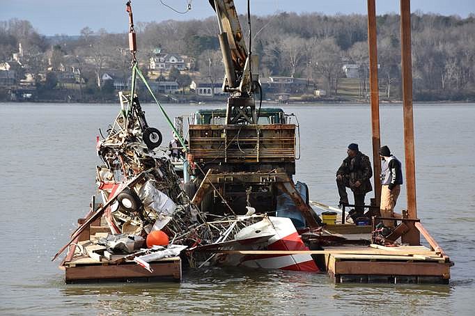 Private contractors on Friday recover the wreckage of a small plane that crashed in Chickamauga Lake on Monday, January 7, 2019. / Contributed photo by Hamilton County Sheriff's Office Public Relations Division