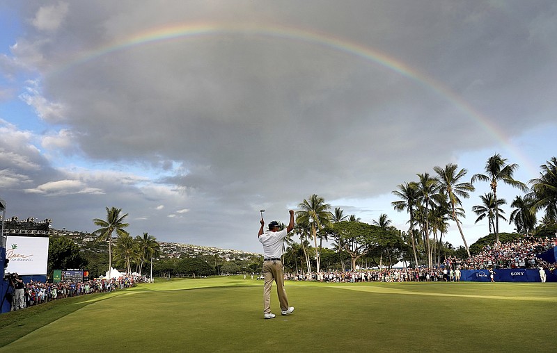 Matt Kuchar celebrates after winning the Sony Open on Sunday at Waialae Country Club in Honolulu.