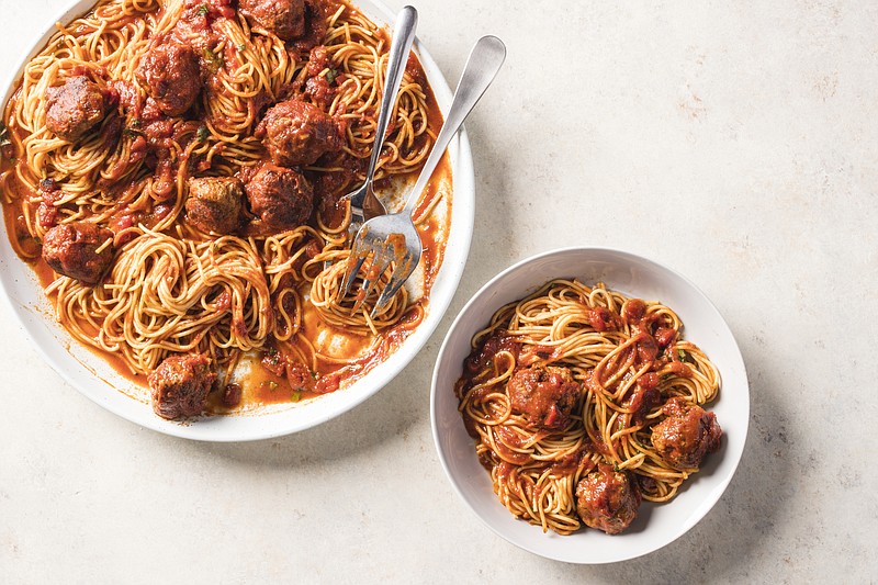 This undated photo provided by America's Test Kitchen in November 2018 shows meatballs and marinara in Brookline, Mass. (Carl Tremblay/America's Test Kitchen via AP)