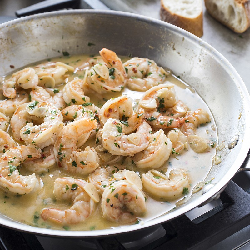 This undated photo provided by America's Test Kitchen in October 2018 shows Shrimp Scampi in Brookline, Mass. This recipe appears in the cookbook "Revolutionary Recipes." (Carl Tremblay/America's Test Kitchen via AP)