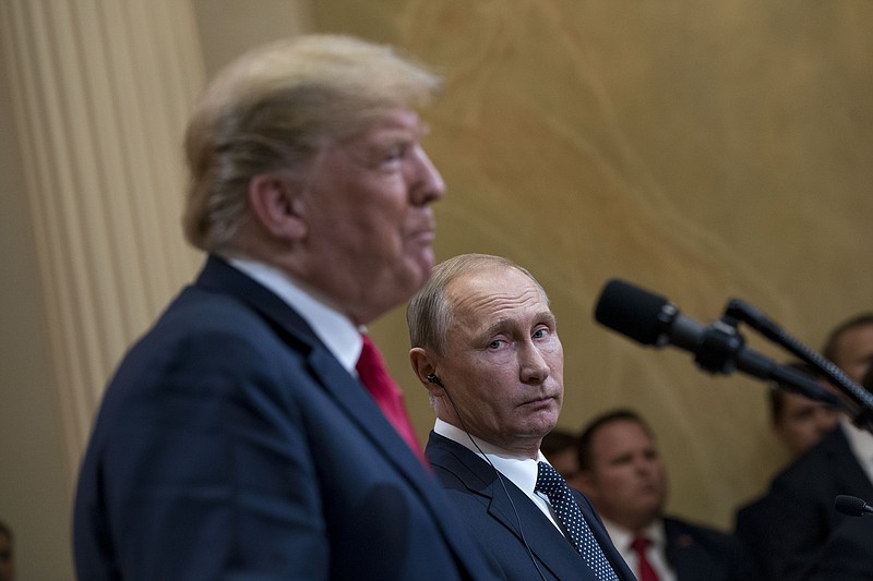 FILE — President Donald Trump with President Vladimir Putin during a joint news conference at the in Helsinki, Finland, last July. Trump's repeatedly stated desire to withdraw from NATO is raising new worries among national security officials amid growing concern about his efforts to keep his meetings with Putin secret from even his own aides, and an FBI investigation into the administration's Russia ties. (Doug Mills/The New York Times)