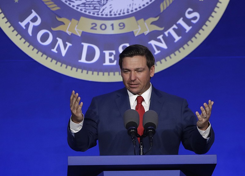 Florida Gov. Ron DeSantis, a Republican, is a strong supporter of school choice. He is shown here at a luncheon in Tallahassee, Fla., the day before he was sworn in earlier this month. (AP Photo/Lynne Sladky)