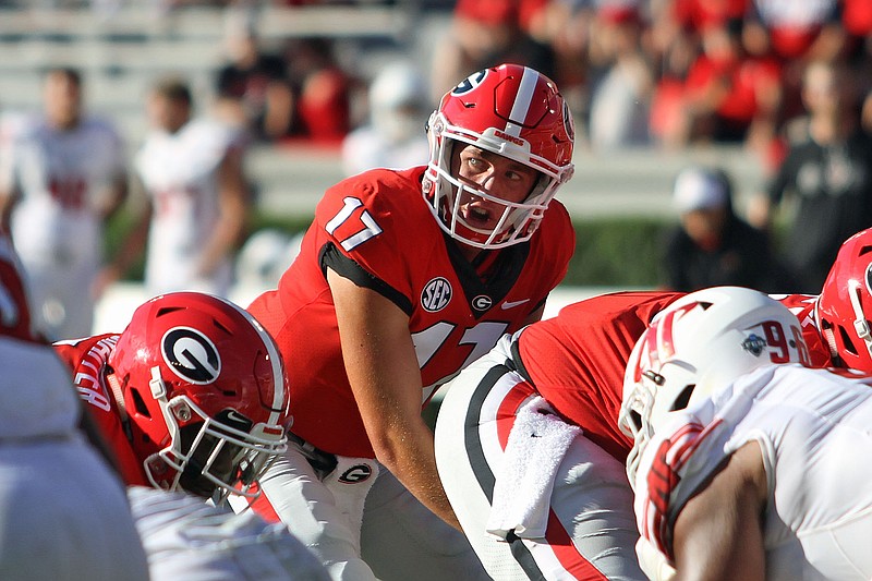 Matthew Downing, who played in four games this past season as a walk-on quarterback, is transferring from Georgia to TCU.