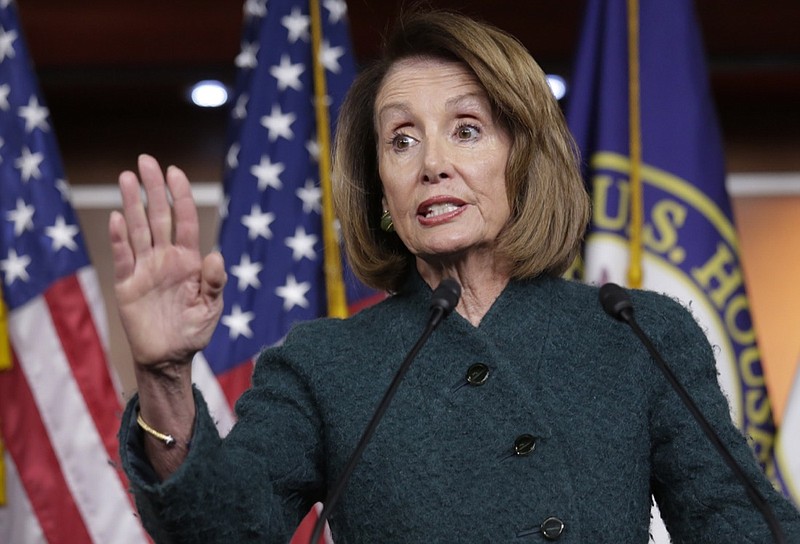 In this Jan. 10, 2019, photo, Speaker of the House Nancy Pelosi, D-Calif., meets with reporters in her first formal news conference, on Capitol Hill in Washington. Pelosi has asked President Donald Trump to postpone his State of the Union address to the nation, set for Jan. 29, until the government reopens. (AP Photo/J. Scott Applewhite)