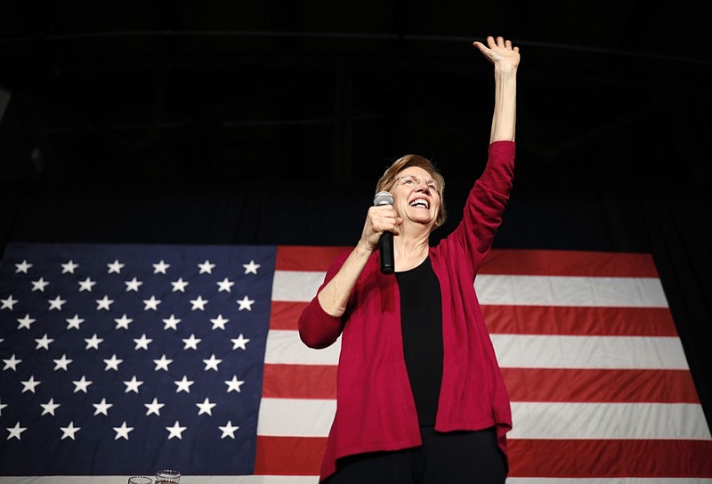 In this Jan. 5, 2019, file photo, Sen. Elizabeth Warren, D-Mass, waves to the crowd during an organizing event at Curate event space in Des Moines, Iowa. Some of the Democrats considering running for president in 2020 say they plan to ignore personal needling from President Donald Trump. (AP Photo/Matthew Putney, File)