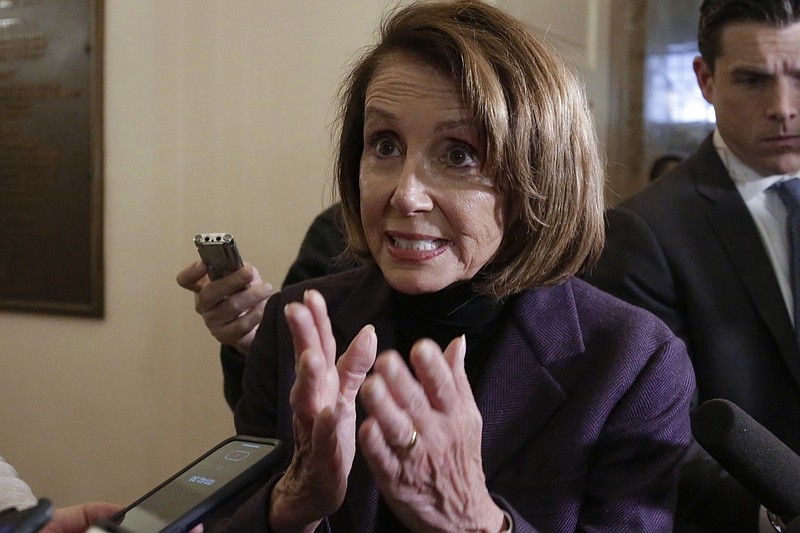 Speaker of the House Nancy Pelosi, D-Calif., takes questions from reporters, Friday, Jan. 18, 2019, on Capitol Hill in Washington. (AP Photo/J. Scott Applewhite)