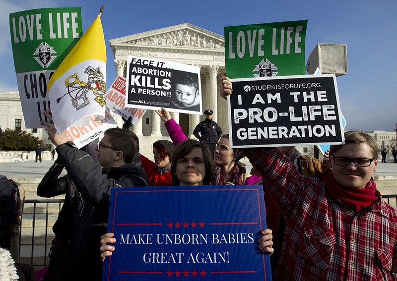 Anti-abortion activists protest outside of the U.S. Supreme Court, during the March for Life in Washington Friday, Jan. 18, 2019. (AP Photo/Jose Luis Magana)

