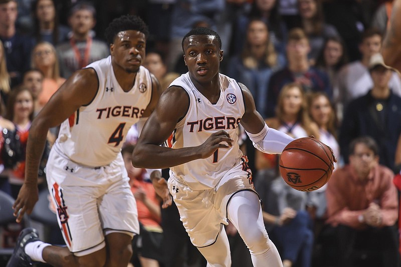 Auburn junior point guard Jared Harper (1) leads the SEC this season with 107 assists overall and an average of 6.7 per game.