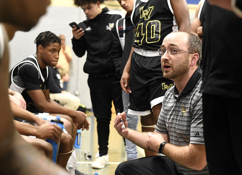 Eric Ford talks to Lookout Valley basketball players during a game in January. After five seasons as coach of the Yellow Jackets, Ford has resigned because he will teach — and possibly help coach — at Ooltewah starting next school year.