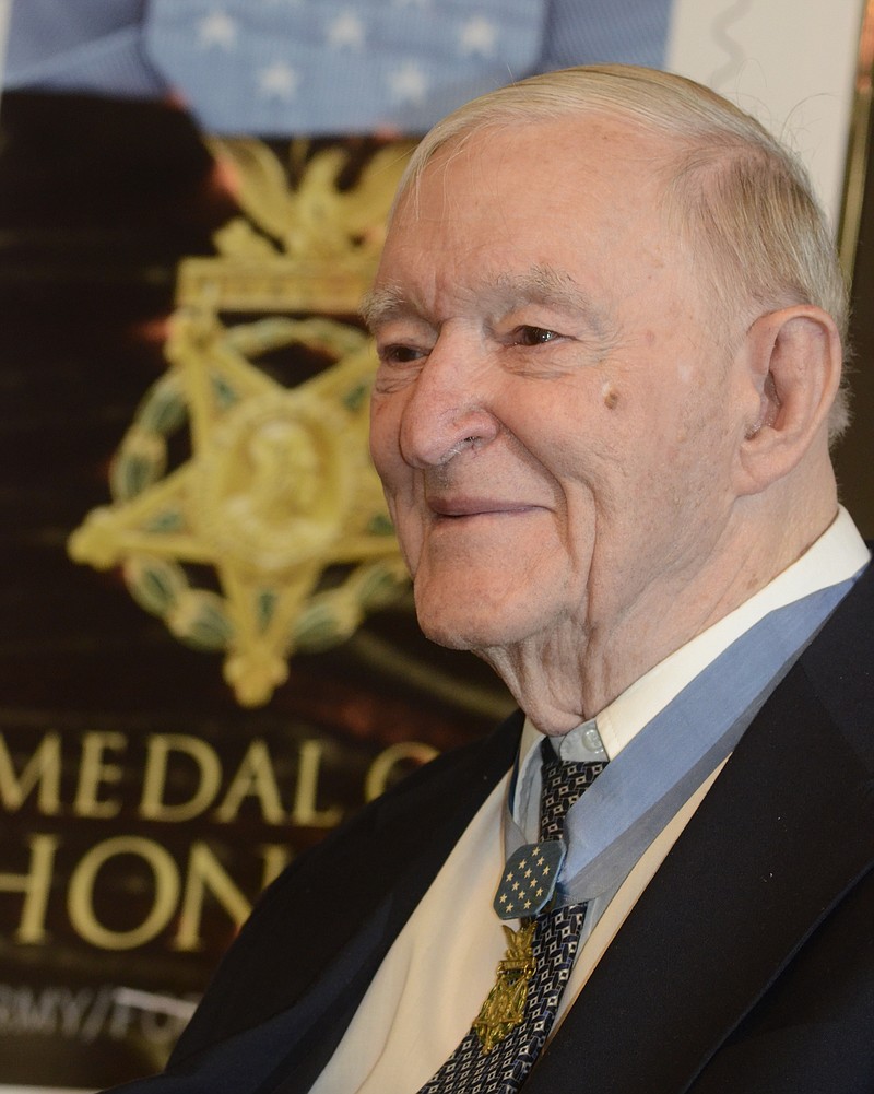 In this 2013 staff file photo, Medal of Honor recipient Charles H. Coolidge attends a ceremony and reception at the Signal Crest United Methodist Church. The event marked the first day of issue of a commemorative stamp honoring Medal of Honor recipients. 