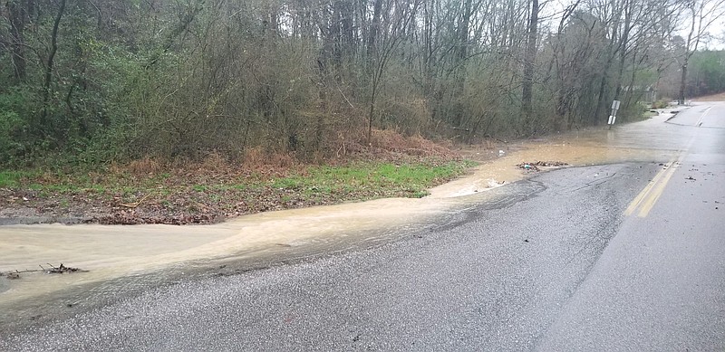 Saturday's consistent rain created hazardous driving conditions on roadways in Hixson and the Middle Valley, including this stretch along the 7600 block of Middle Valley Road.