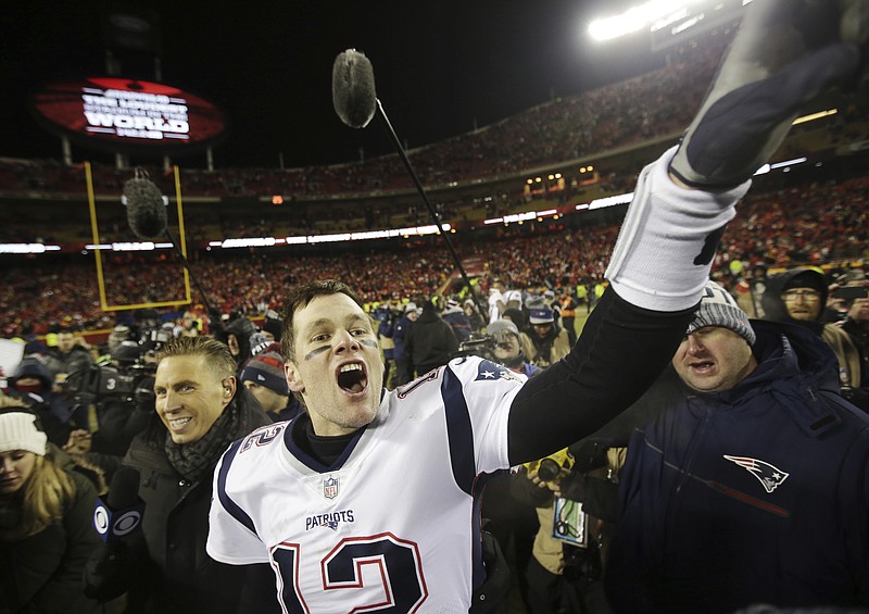 New England Patriots quarterback Tom Brady celebrates after leading his team to an overtime victory against the Kansas City Chiefs in the AFC title game Sunday night.