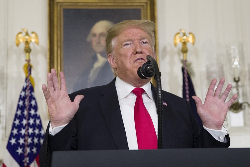 President Donald Trump speaks about the partial government shutdown, immigration and border security in the Diplomatic Reception Room of the White House, in Washington, Saturday, Jan. 19, 2019. (AP Photo/Alex Brandon)