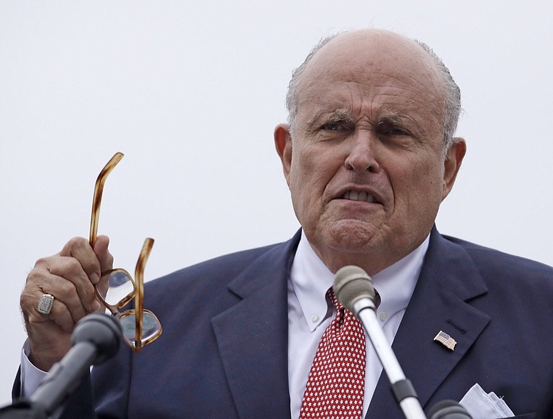 FILE - In this Aug. 1, 2018, file photo, Rudy Giuliani, an attorney for President Donald Trump, speaks in Portsmouth, N.H. On Monday, Jan. 21, 2019, Giuliani walked back comments he made about discussions Trump had with his former personal attorney about a real estate project in Moscow during the presidential election campaign. (AP Photo/Charles Krupa, File)

