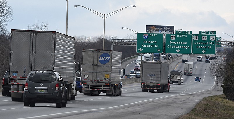 Traffic moves on I-24 near Moccasin Bend on Monday, Feb. 9, 2015, in Chattanooga, Tenn. Thrive 2055 long-range planners are looking at ways to deal with traffic congestion in Chattanooga, where the metro area is tops in the nation in volume of freight passing through on the way to somewhere else. 