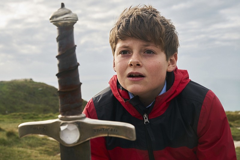 This image released by 20th Century Fox shows Louis Ashbourne Serkis in a scene from "The Kid Who Would Be King." (Kerry Brown/20th Century Fox via AP)