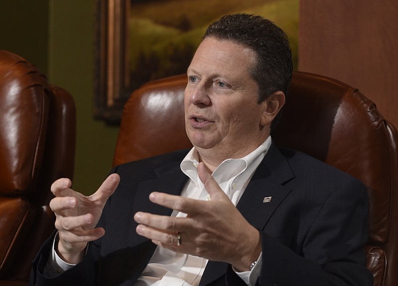 Billy Carroll, president and CEO of SmartFinancial, speaks during an interview in the offices of Cornerstone Bank on Tuesday, Sept. 1, 2015, in Chattanooga, Tenn.
