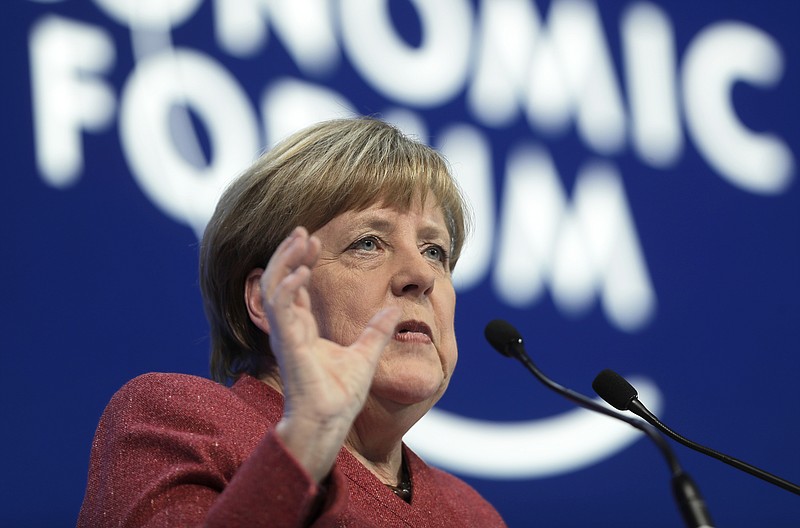 German Chancellor Angela Merkel addresses the annual meeting of the World Economic Forum in Davos, Switzerland, Wednesday, Jan. 23, 2019. (AP Photo/Markus Schreiber)